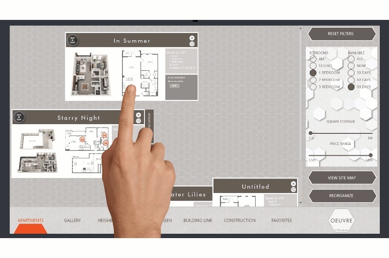 Prospect comparing apartment floor plans on Pynwheel touchscreen